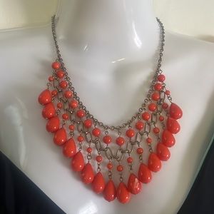 Orange swirl beaded necklace